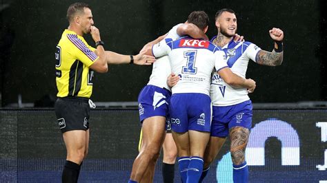 Concussions mar wet slog as Bulldogs down Roosters .